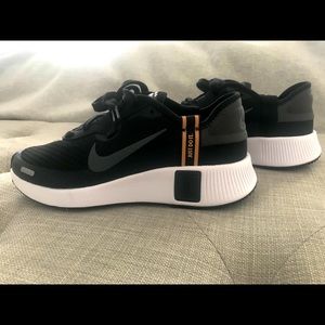 Nike black and gold sneakers- 7 US women brand new